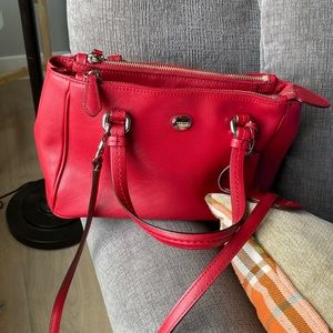 Coach red leather purse.